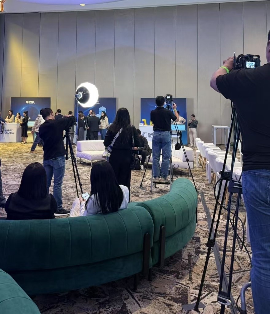 Video production crew covering a corporate conference